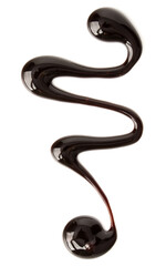 Chocolate syrup drop isolated on white background. Top view. .