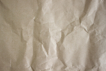 Flat lay craft paper texture. Crumpled paper as nice background, close up