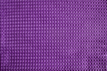 Bright purple towel, closeup fabric texture, cozy domestic