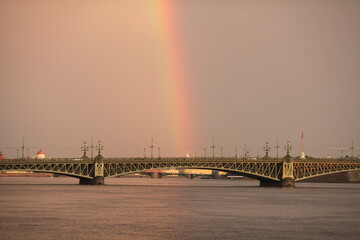 Fototapeta na wymiar rainbow bridge over the river