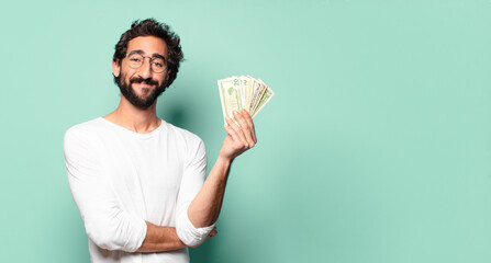 young crazy bearded man with dollar banknotes