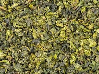 Fototapeta na wymiar Tieguanyin Tea leaves, Chinese famous oolong tea background