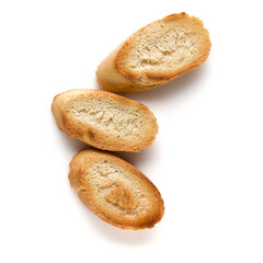 Toasted baguette slices isolated on white background close up.  Toast, crouton.   Top view.