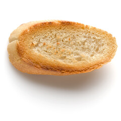 Toasted baguette slice isolated on white background close up.  Toast, crouton.   Top view.