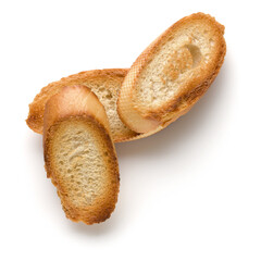 Toasted baguette slices isolated on white background close up.  Toast, crouton.   Top view.