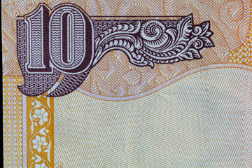 Fragment of old 10 Indian rupee obverse