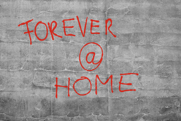 writing on concrete wall:  forever@hmoe
