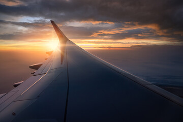 Beautiful sunset. View from inside window aircraft