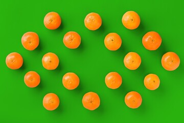 Fruit pattern of fresh orange tangerine or mandarin on green background. Flat lay, top view. Pop art design, creative summer concept. Citrus in minimal style.