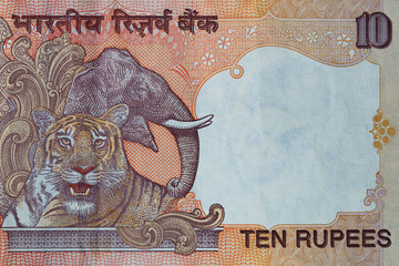 Fragment of old 10 Indian rupee reverse