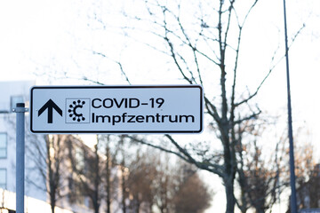 Road sign with sign for the vaccination centre in times of covid 19 and corona taken in Bad Homburg, Germany, 13.02.2021
