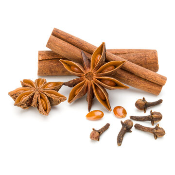 Cinnamon sticks and anise star isolated on white background close up