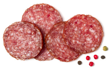 Slices of salami isolated on white background closeup. Sausage top view.