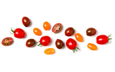 various colorful tomatoes isolated on white background. Top view, flat lay. Creative layout.