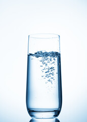 water glass on blue background