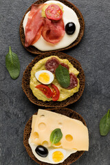 Variety of open sandwiches. Top view, flat lay.