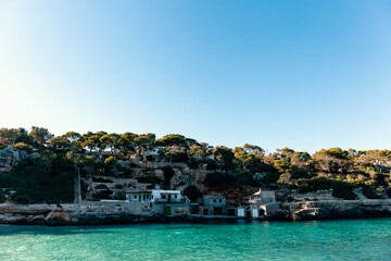 Houses on the edge of the cliff next to the sea
