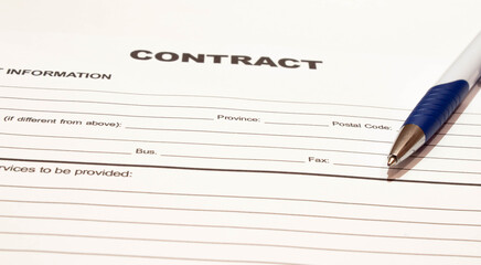 Pen on the contract papers