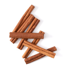 Cinnamon sticks isolated on white background closeup. Canella spice. Aromatic condiment background. Flat lay, top view..