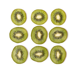 Creative layout made of kiwi slices. Flat lay, top view. Vegetables isolated on white background. Food ingredient pattern..