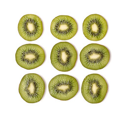 Fototapeta premium Creative layout made of kiwi slices. Flat lay, top view. Vegetables isolated on white background. Food ingredient pattern..