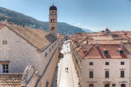 People are strolling through Stradun street in Dubrovnik, Croatia