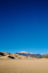 Sand dunes agains the blue sky. Nature landscape. National park, Great Sand Dunes Colorado