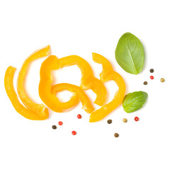 Yellow pepper slices with basil leaves isolated over white background cutout. Top view, flat lay..