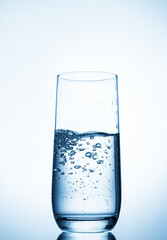 water glass on blue background