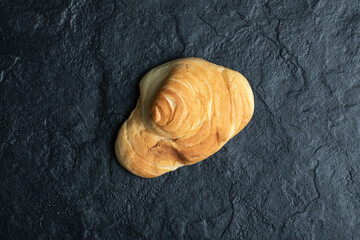 Delicious fresh pastry on a dark background