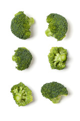 Creative layout made of broccoli. Flat lay, top view. Vegetables isolated over white background. Food ingredient pattern..