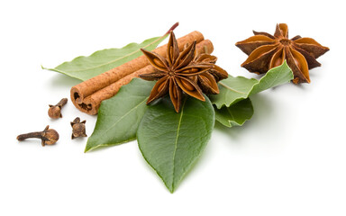 Various spices isolated over white background. Bay leaves, cinnamon and anise stars..