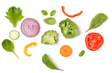 Creative layout made of tomato slice, onion, cucumber, basil leaves. Flat lay, top view. Food concept. Vegetables isolated on white background. Food ingredient pattern.