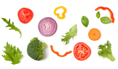 Creative layout made of tomato slice, onion, cucumber, basil leaves. Flat lay, top view. Food concept. Vegetables isolated on white background. Food ingredient pattern.