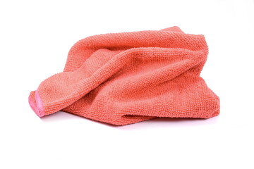 Red micro fiber towel isolated on white background. Clean, new red microfiber cloth isolated on white background