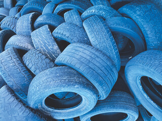 Obraz premium stack of tires in blue