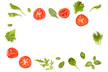 Creative layout made of tomato slices and lettuce salad leaves. Flat lay, top view. Food concept. Vegetables isolated on white background. Food ingredients pattern with copy space.