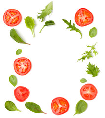 Creative layout made of tomato slices and lettuce salad leaves. Flat lay, top view. Food concept. Vegetables isolated on white background. Food ingredients pattern with copy space.