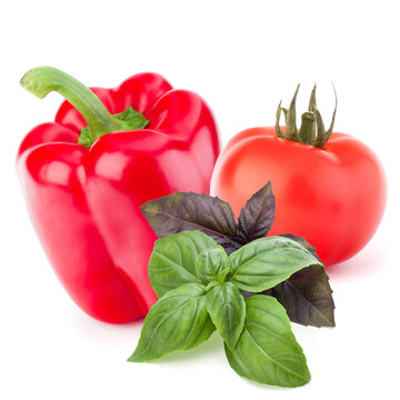 Isolated vegetables. Sweet bell pepper and  tomato isolated on white background