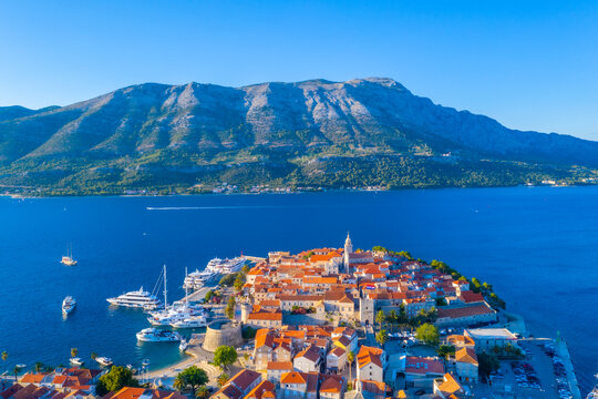 Aerial view of Croatian town Korcula and Sveti Ilija mountain