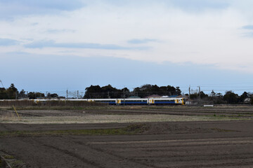train through a field