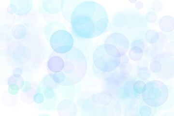 Abstract blur blue bokeh circles on white background.