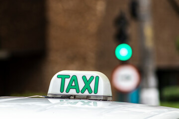 Taxi sign on roof of vehicle in Sao Paulo city