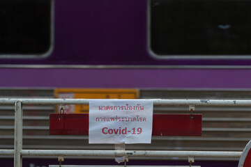 Measures sign to prevent the spread of coronavirus at Hua Hin Railway Station, Thailand - January 17,2021;