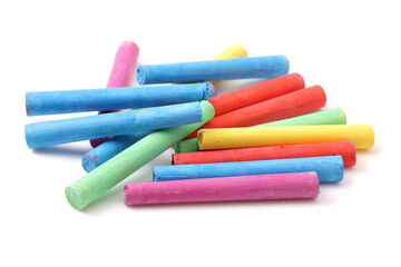 chalks in a variety of colors arranged on a white background
