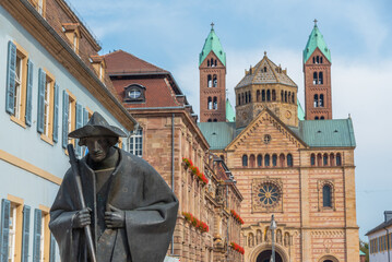Jakobspilger statue and the cathedral at the end of Maximilianstrasse in Speyer, Germany
