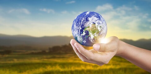 Globe in hand, Earth energy saving concept, image furnished by NASA