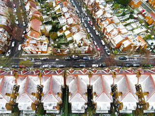 Aerial view of snowy London suburb in winter