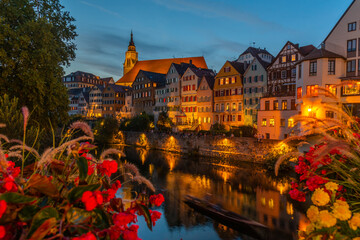 Sunset view of colorful facades of houses alongside river Neckar in Tubingen, Germany