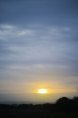 sunrise in the sky on a cloudy day in Cornwall
